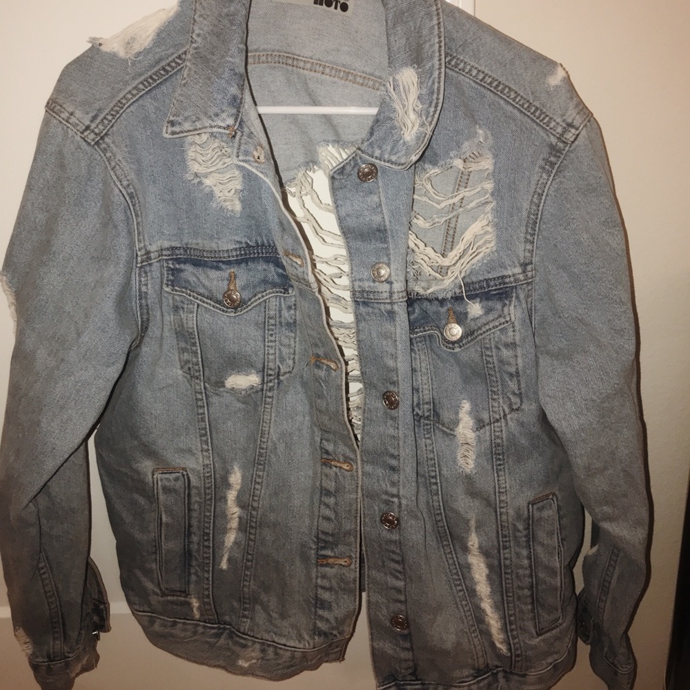 Distressed denim jacket